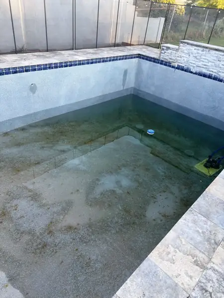 A pool drained for service
