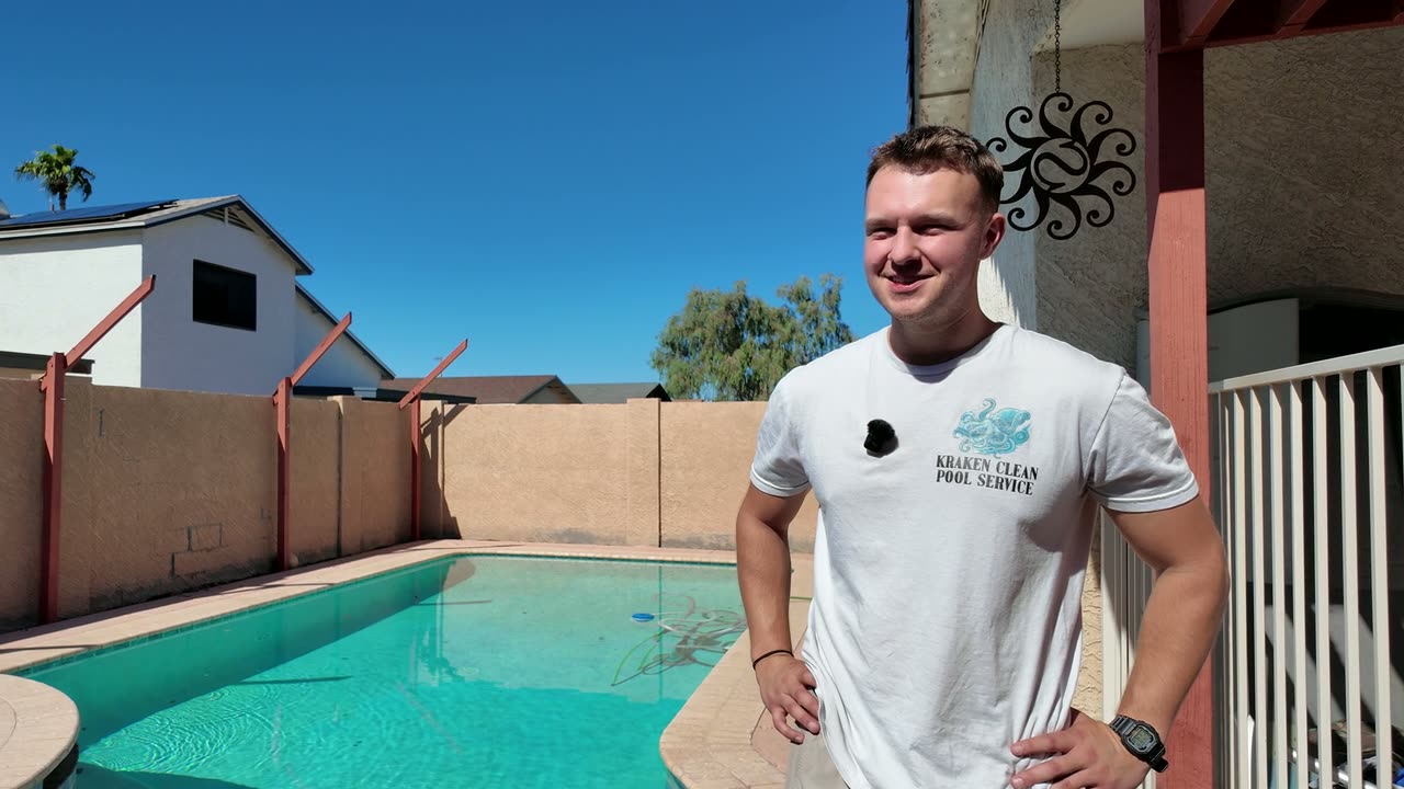Spencer smiling beside a pool, telling the story behind the Kraken Clean AZ name